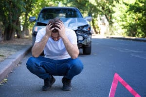 man stressed from accident